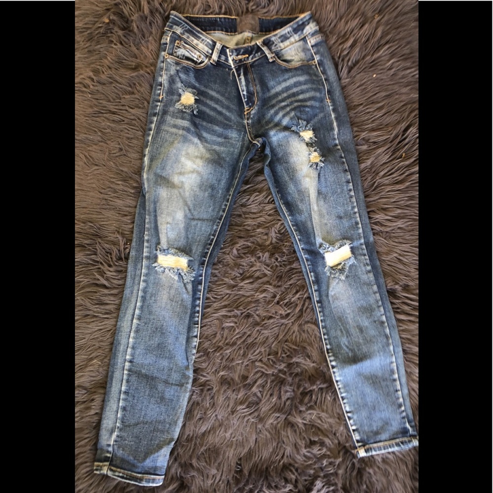 Ripped Dark Blue Jeans